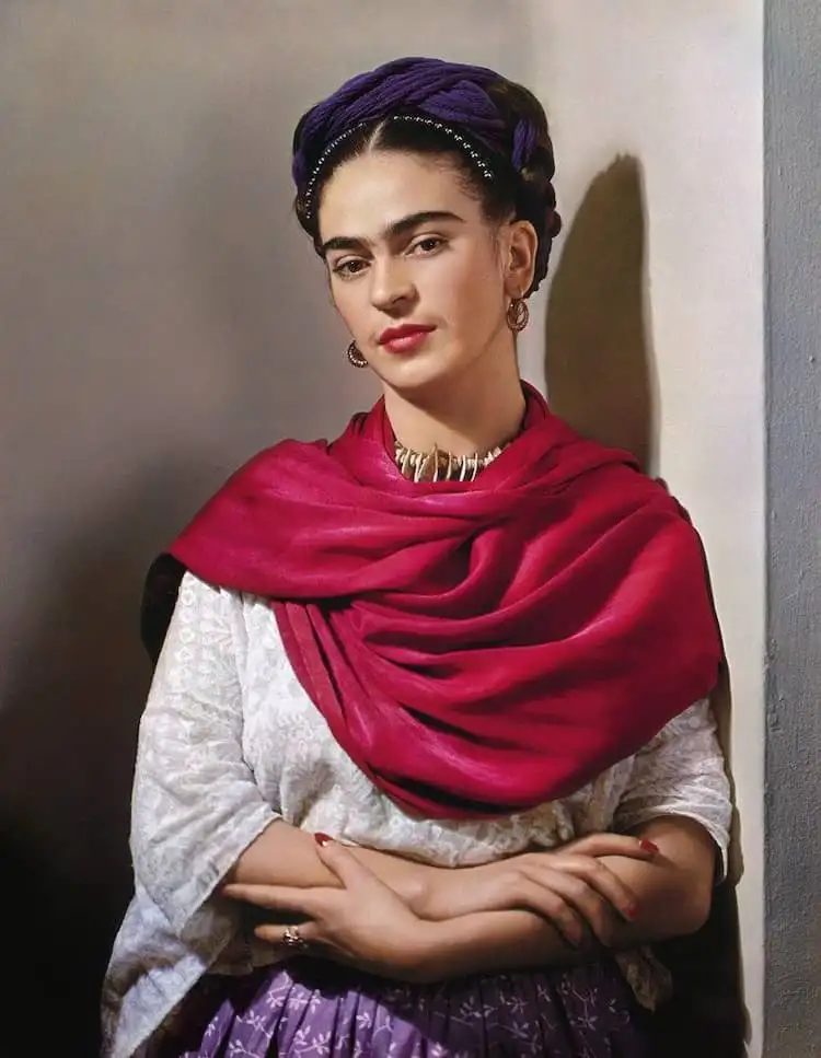 frida-kahlo-standing-by-a-wall - Spiritual Teachers Voodoo frida kahlo